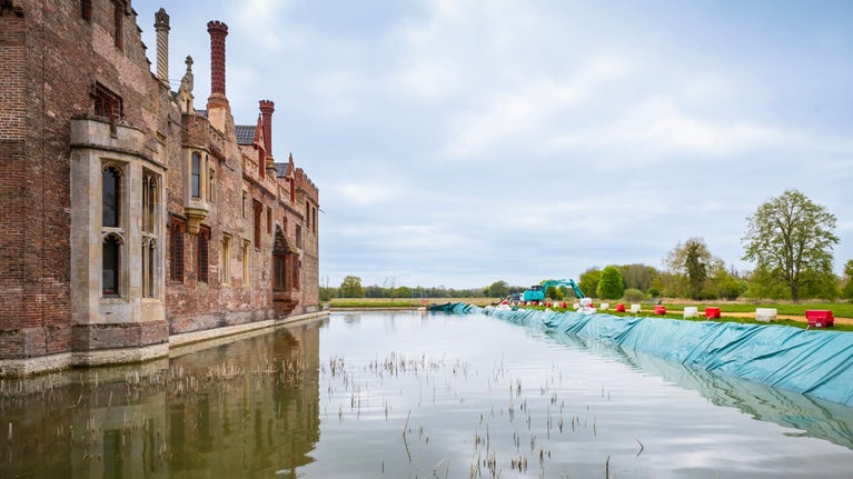 View of moat repairs at Oxburgh Estate in Norfolk
